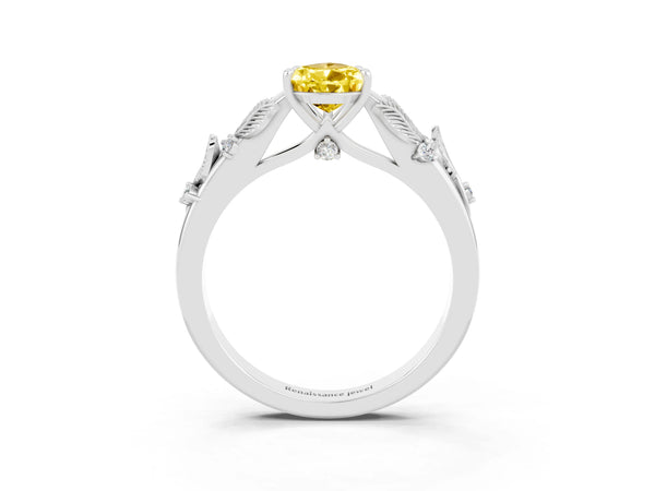 Platinum Pear Cut Yellow Sapphire Solitaire Ring with Leaf Motif Band and Four-Prong Setting