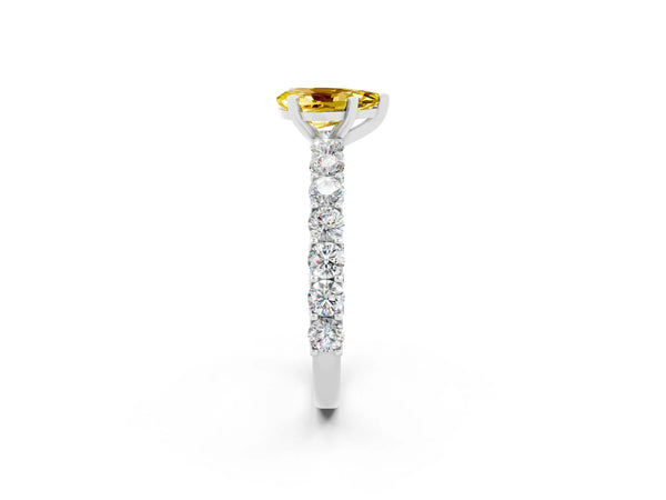 Platinum Pear Cut Yellow Sapphire Solitaire Ring with Shared Prong Pavé Band and Four-Prong Setting