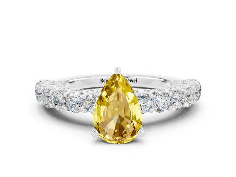 White gold Pear Cut Yellow Sapphire Solitaire Ring with Shared Prong Pavé Band and Four-Prong Setting