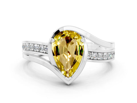 White gold Pear Cut Yellow Sapphire Solitaire Ring with Split Shank and Prong Setting