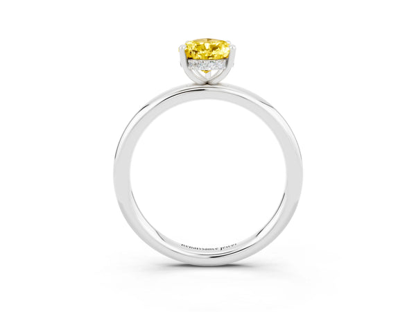 Platinum Pear Cut Yellow Sapphire Solitaire Ring with Thin Band and Four-Prong Setting