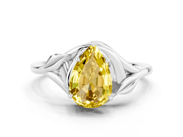 White gold Pear Cut Yellow Sapphire Solitaire Ring with Twist Band and Four-Prong Setting