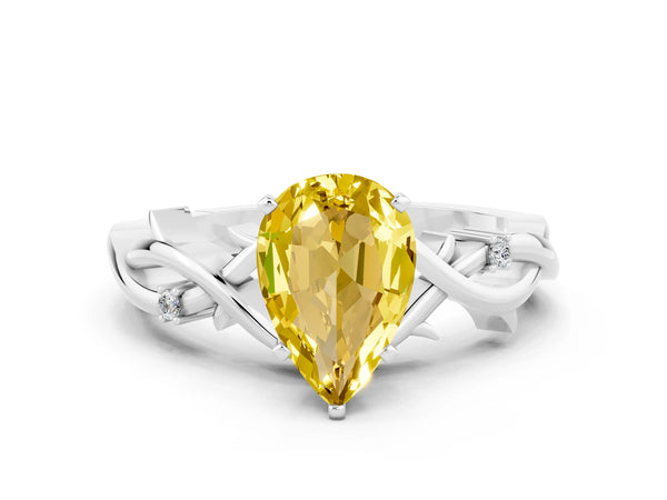 Silver Pear Cut Yellow Sapphire Solitaire Ring with Twisted Band and Prong Setting
