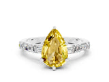 White gold Pear Cut Yellow Sapphire Solitaire with Side Baguettes and Channel Set Band_24