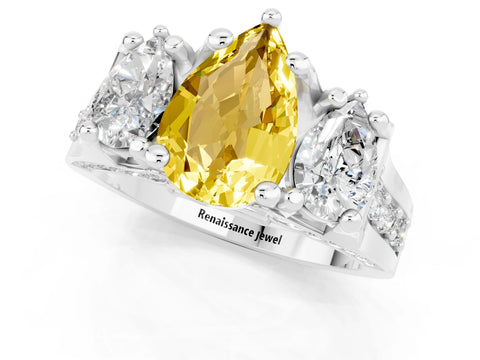 White gold Pear Cut Yellow Sapphire Three-Stone Ring with Channel Set Band and Four-Prong Setting_1