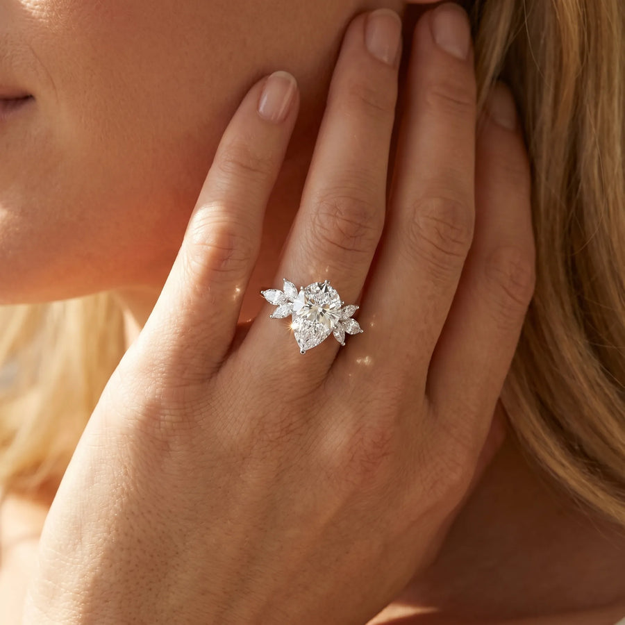 White gold Pear Diamond Floral Cluster Ring with Marquise Side Stones and Six-Prong Solitaire Setting