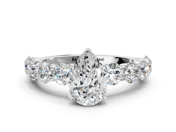 White gold Pear Cut Diamond Prong Setting with Side Stones on a Pave Band