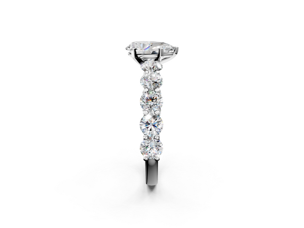 White gold Pear Cut Diamond Prong Setting with Side Stones on a Pave Band