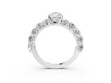 White gold Pear Diamond Prong Setting with Side Stones on a Pave Band_182
