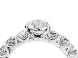 White gold Pear Diamond Prong Setting with Side Stones on a Pave Band_183