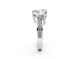 White gold Pear Diamond Three-Stone Ring with Prong Setting and Textured Band_31