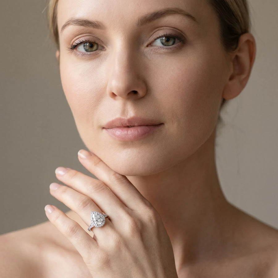 White gold Pear Halo Diamond Engagement Ring with Split Shank Band and Four-Prong Setting