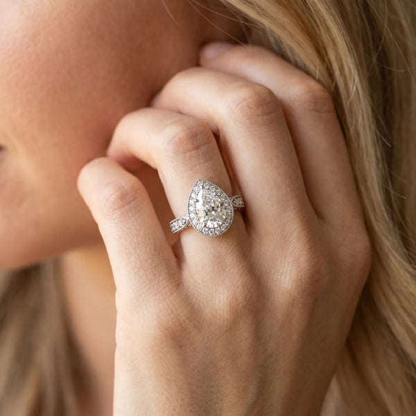 White gold Pear Halo Diamond Engagement Ring with Split Shank Band and Four-Prong Setting