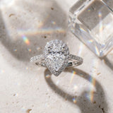 White gold Pear Halo Diamond Ring with Pavé Band and Three-Prong Setting_22