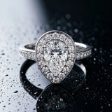 White gold Pear Halo Pavé Diamond Engagement Ring with Bezel Setting_52