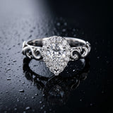 White gold Pear Halo Scrollwork Engagement Ring with Prong Setting_9