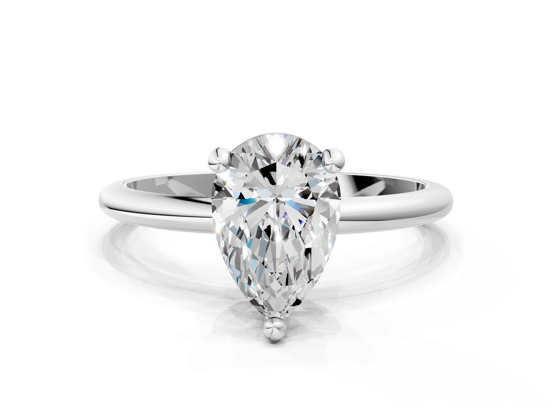 White gold Pear Solitaire Diamond Ring with 4-Prong Setting on a Classic Band_3
