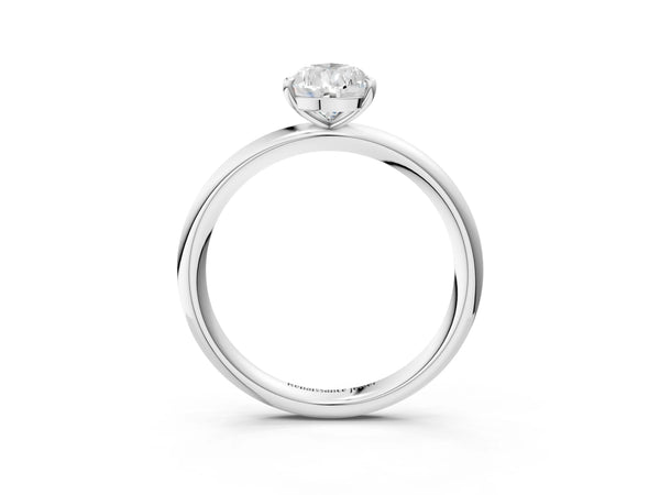 White gold Pear Solitaire Diamond Ring with Four-Prong Setting on a Plain Band