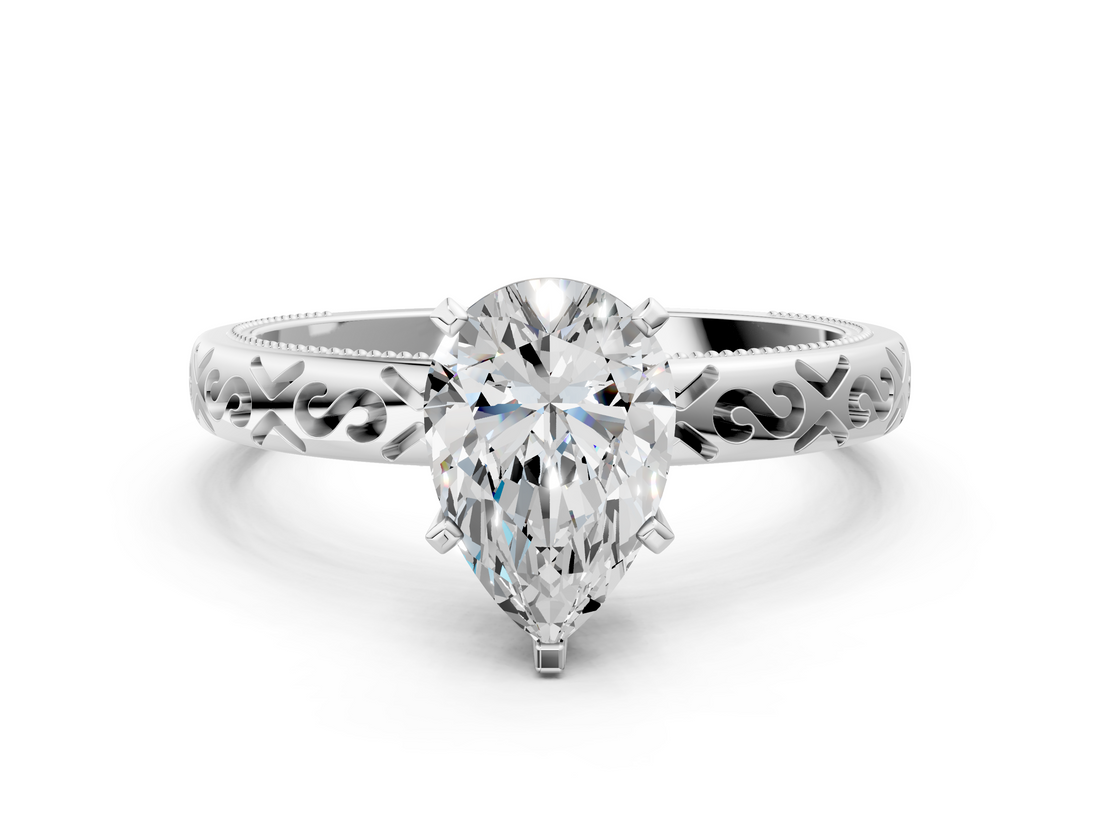 White gold Pear Solitaire Engagement Ring with Scrollwork Band and Four-Prong Setting_134