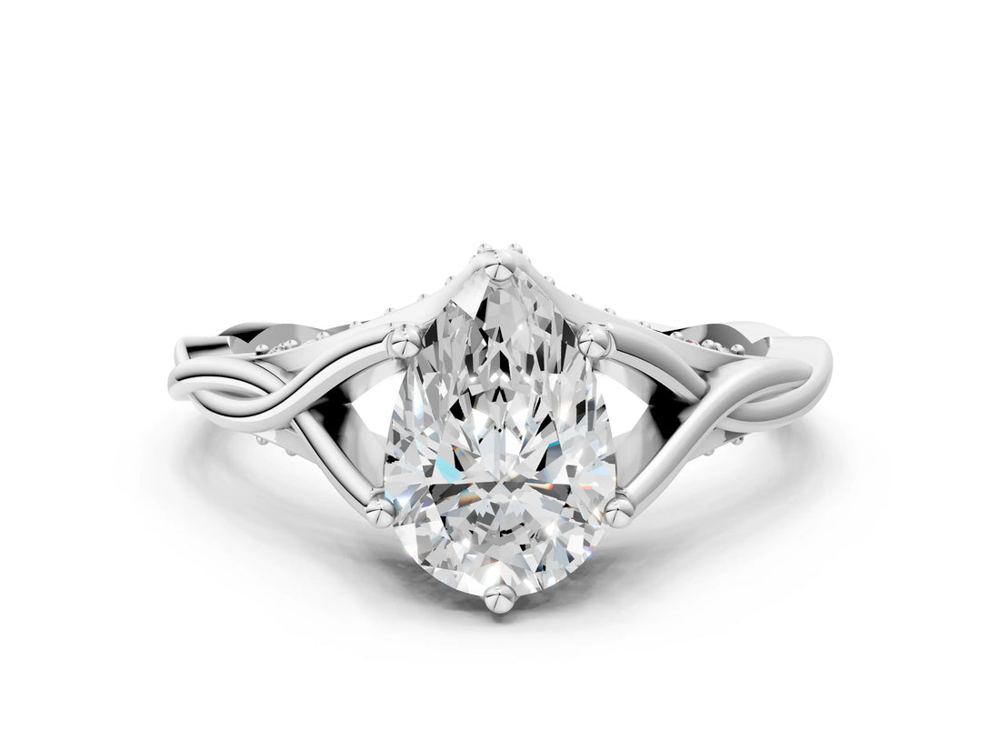 White gold Pear Solitaire Twist Band Six-Prong Setting