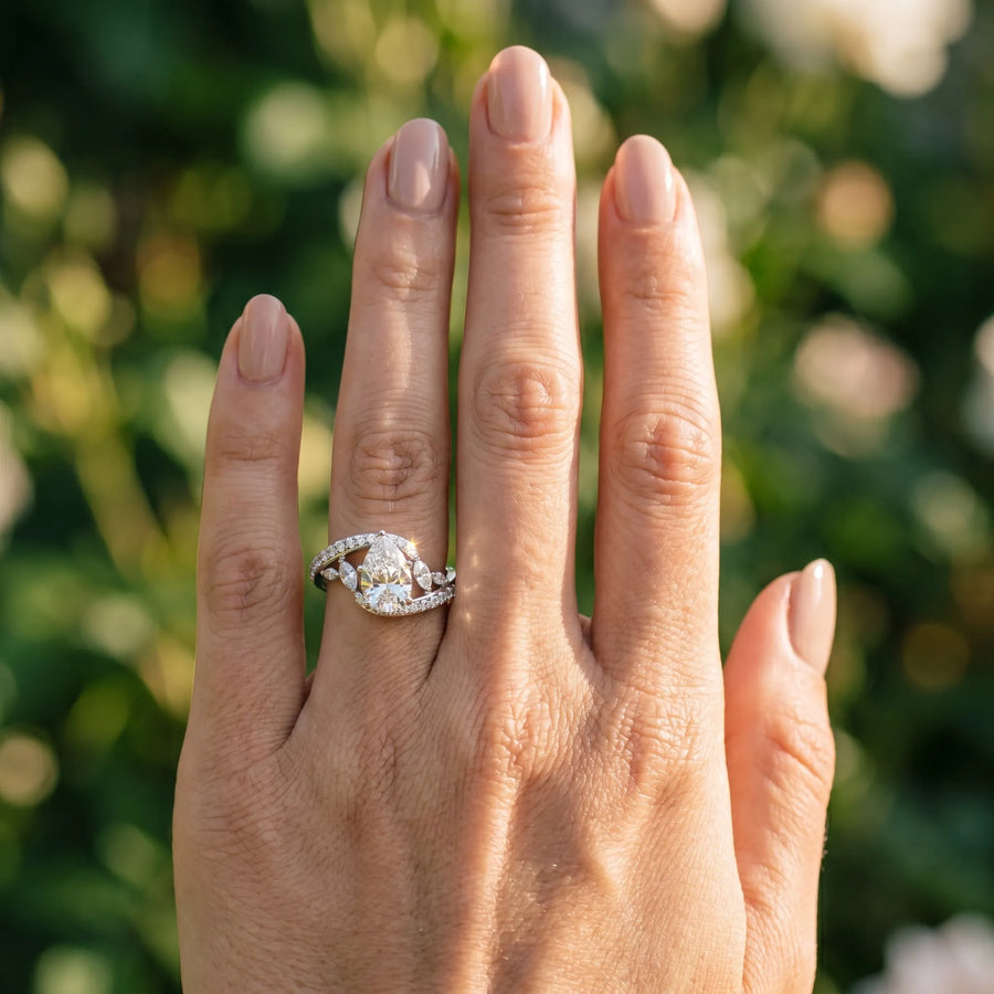 White gold Pear Solitaire with Pavé Twist Band and Four-Prong Setting