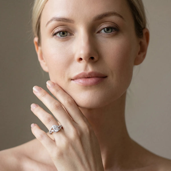White gold Pear Solitaire with Pavé Twist Band and Four-Prong Setting
