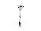 White gold Pear Solitaire with Tapered Baguette Side Stones on a Classic Band with Six-Prong Setting_165