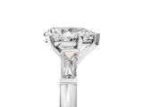 White gold Pear Solitaire with Tapered Baguette Side Stones on a Classic Band with Six-Prong Setting_170