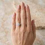 White gold Pear Solitaire with Tapered Baguette Side Stones on a Classic Band with Six-Prong Setting_189