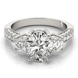 White gold Pear Three-Stone Diamond Ring with Pavé Band and Four-Prong Setting 1