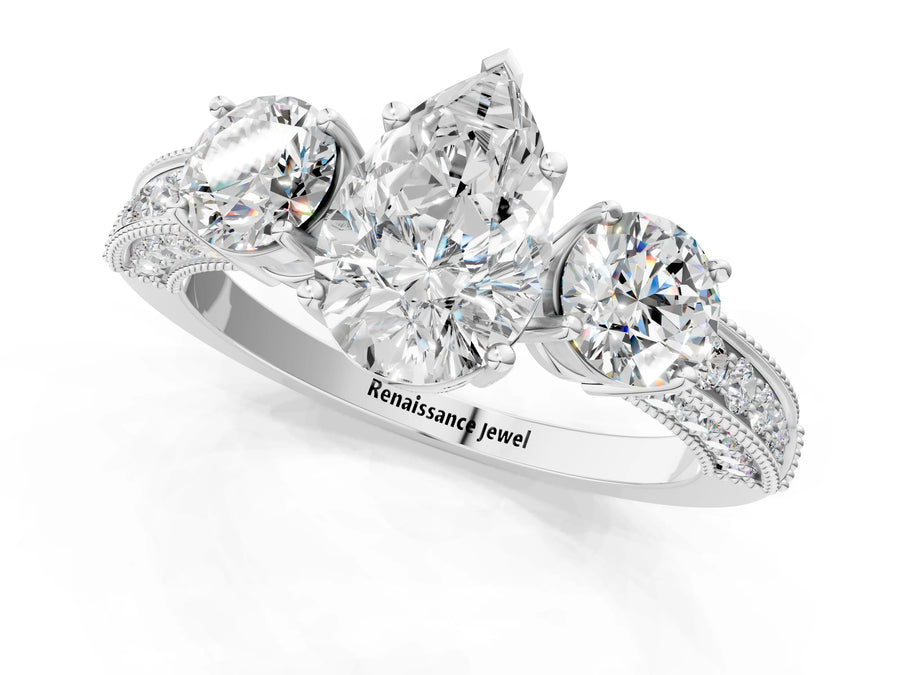 White gold Pear Three-Stone Diamond Ring with Pavé Band and Four-Prong Setting
