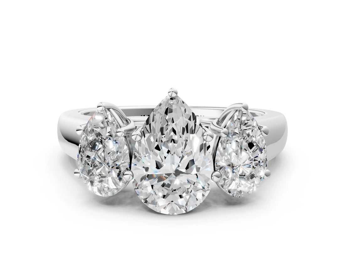 White gold Pear Three-Stone Diamond Ring with Prong Setting on a Classic Band_15