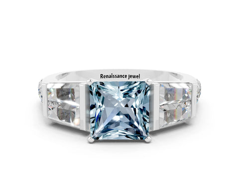 White gold Princess Cut Aquamarine Engagement Ring with Baguette Side Stones and Channel Set Band