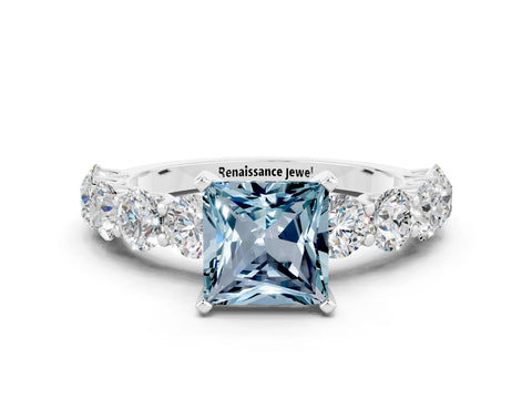 White gold Princess Cut Aquamarine Prong Setting with Side Stones on a Pave Band
