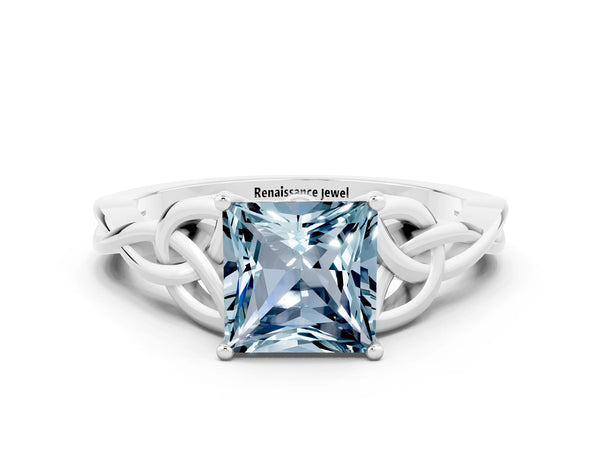 Silver Princess Cut Aquamarine Solitaire Engagement Ring with Celtic Knot Band and Four-Prong Setting