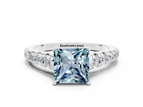 White gold Princess Cut Aquamarine Solitaire Ring with Cathedral Setting and Pavé Band