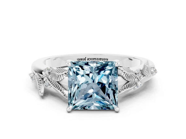 Silver Princess Cut Aquamarine Solitaire Ring with Leaf Motif Band and Four-Prong Setting