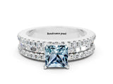 White gold Princess Cut Aquamarine Solitaire Ring with Pavé and Channel Set Band