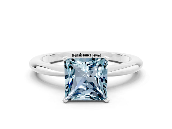 Silver Princess Cut Aquamarine Solitaire Ring with Six-Prong Setting and Classic Band