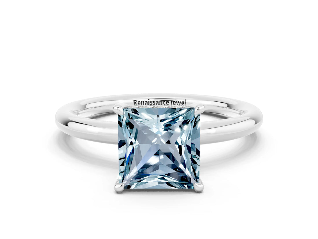 White gold Princess Cut Aquamarine Solitaire Ring with Thin Band and Four-Prong Setting