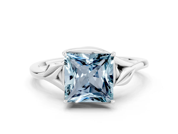 Silver Princess Cut Aquamarine Solitaire Ring with Twist Band and Four-Prong Setting