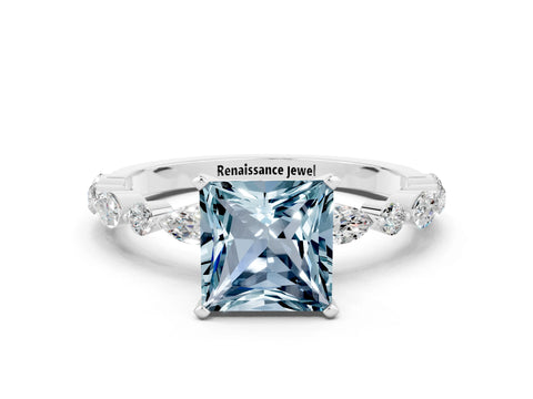 White gold Princess Cut Aquamarine Solitaire with Side Stones on a Pavé Band and Four-Prong Setting