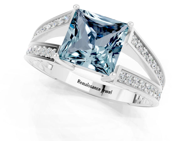 Platinum Princess Cut Aquamarine Split Shank Ring with Pavé Band and Four-Prong Setting