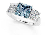 Silver Aquamarine Three-Stone Ring with Four-Prong Setting and Classic Band