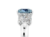 Silver Aquamarine Three-Stone Ring with Four-Prong Setting and Classic Band