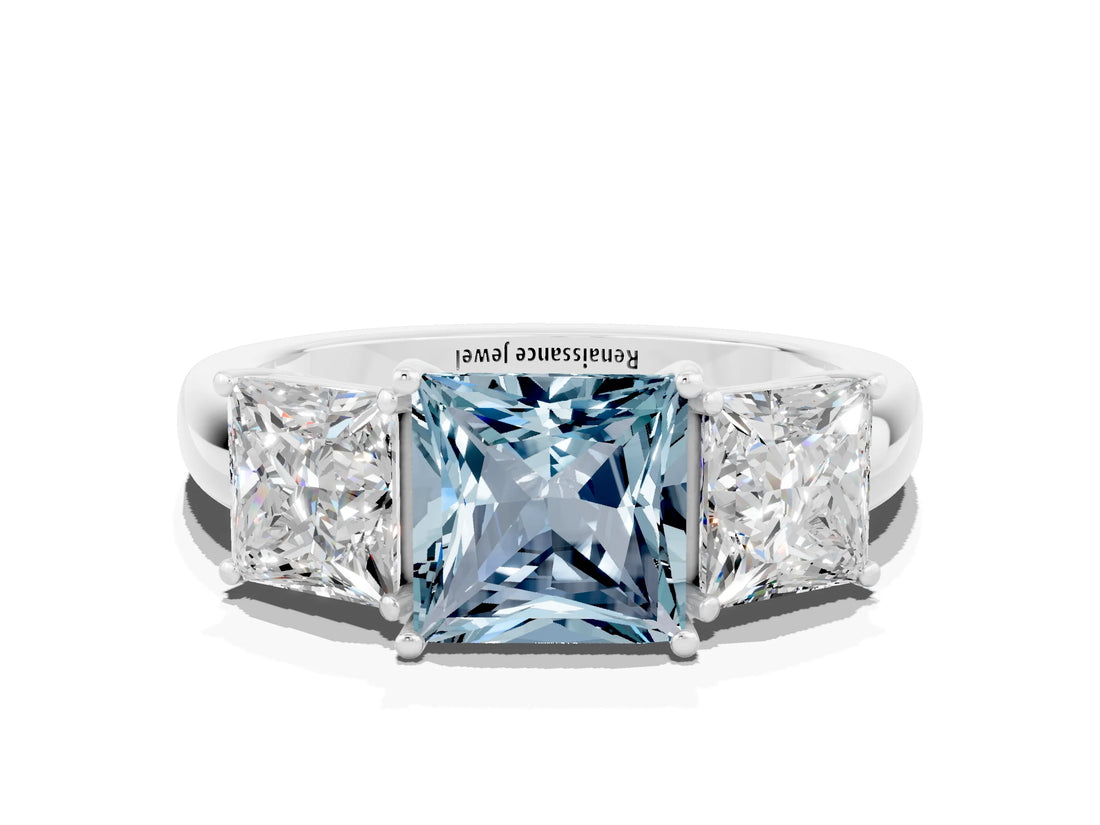 Silver Aquamarine Three-Stone Ring with Four-Prong Setting and Classic Band