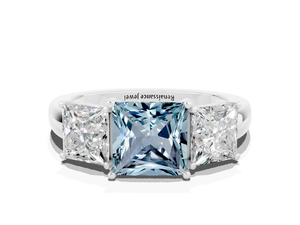Silver Aquamarine Three-Stone Ring with Four-Prong Setting and Classic Band