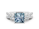 White gold Princess Cut Aquamarine Three-Stone Ring with Pavé Split Shank and Four-Prong Setting
