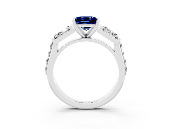 Platinum Princess Cut Blue Sapphire Engagement Ring with Baguette Side Stones and Channel Set Band