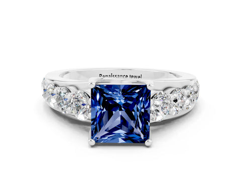 White gold Princess Cut Blue Sapphire Engagement Ring with Pavé Band and Four-Prong Setting